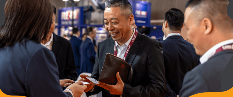 Image showing attendees exchanging business cards at Intermodal Europe